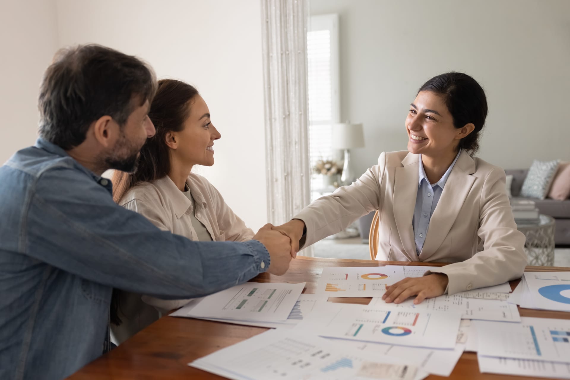 Homeowners planning their new home with a design consultant